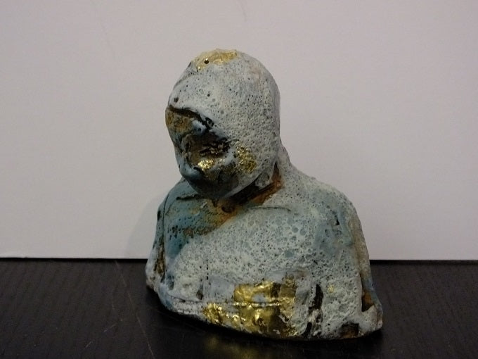 Blue and Gold Figure Looking Down
